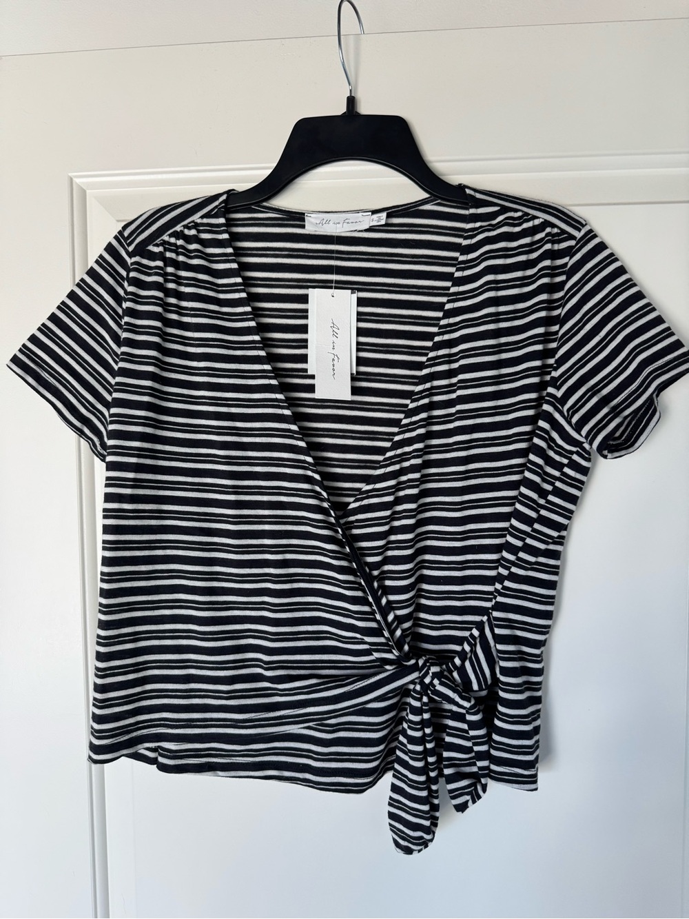 All in Favor Black & White Striped Tie-Front V-Neck Top
